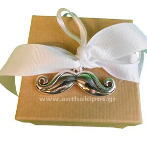 Christening bonbonniere with a box and a mustache motif tied on it